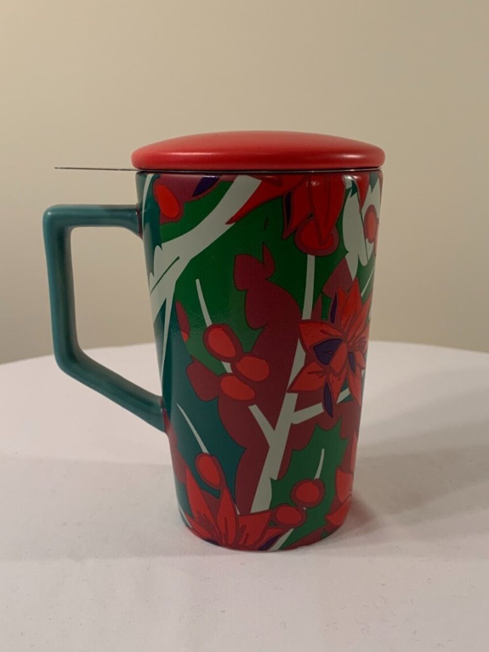 Teavana Infuser 12oz Mug with lid included care instruction and tea strainer.